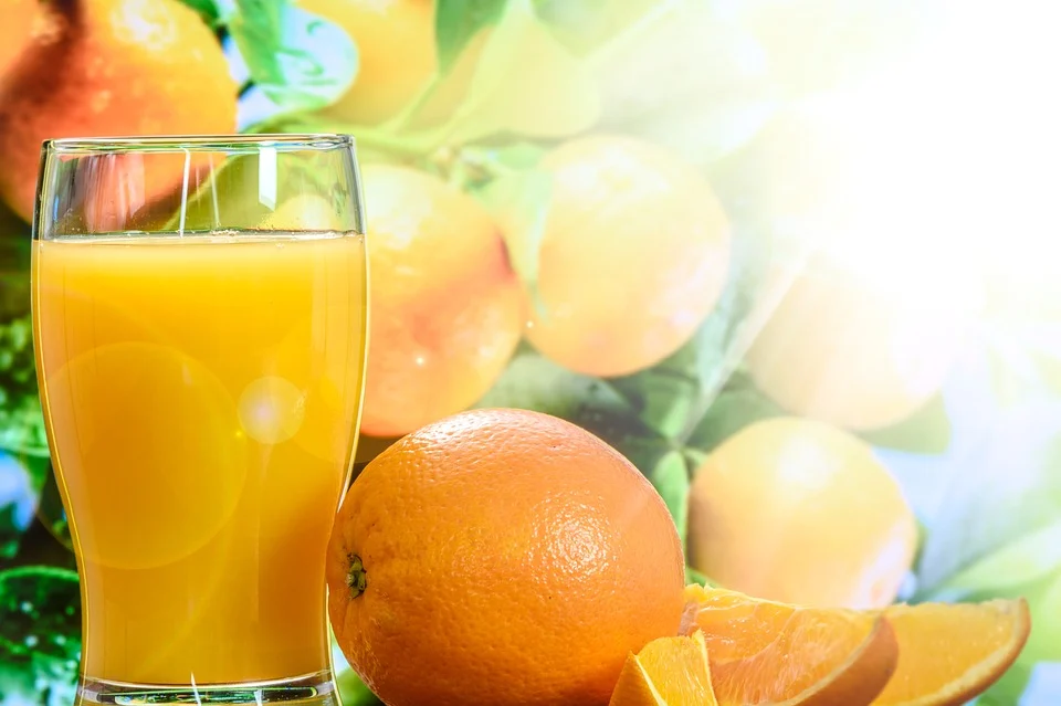 https://pixabay.com/photos/orange-juice-cup-tree-1921548/